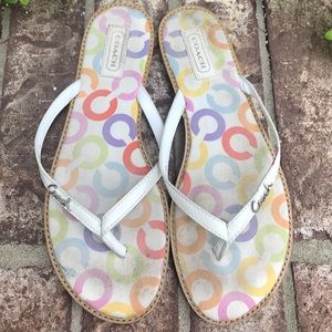Coach logo flip flops